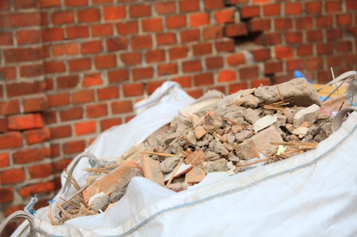 Construction site with builders waste being cleared